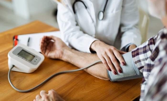 older gentleman getting his blood pressure